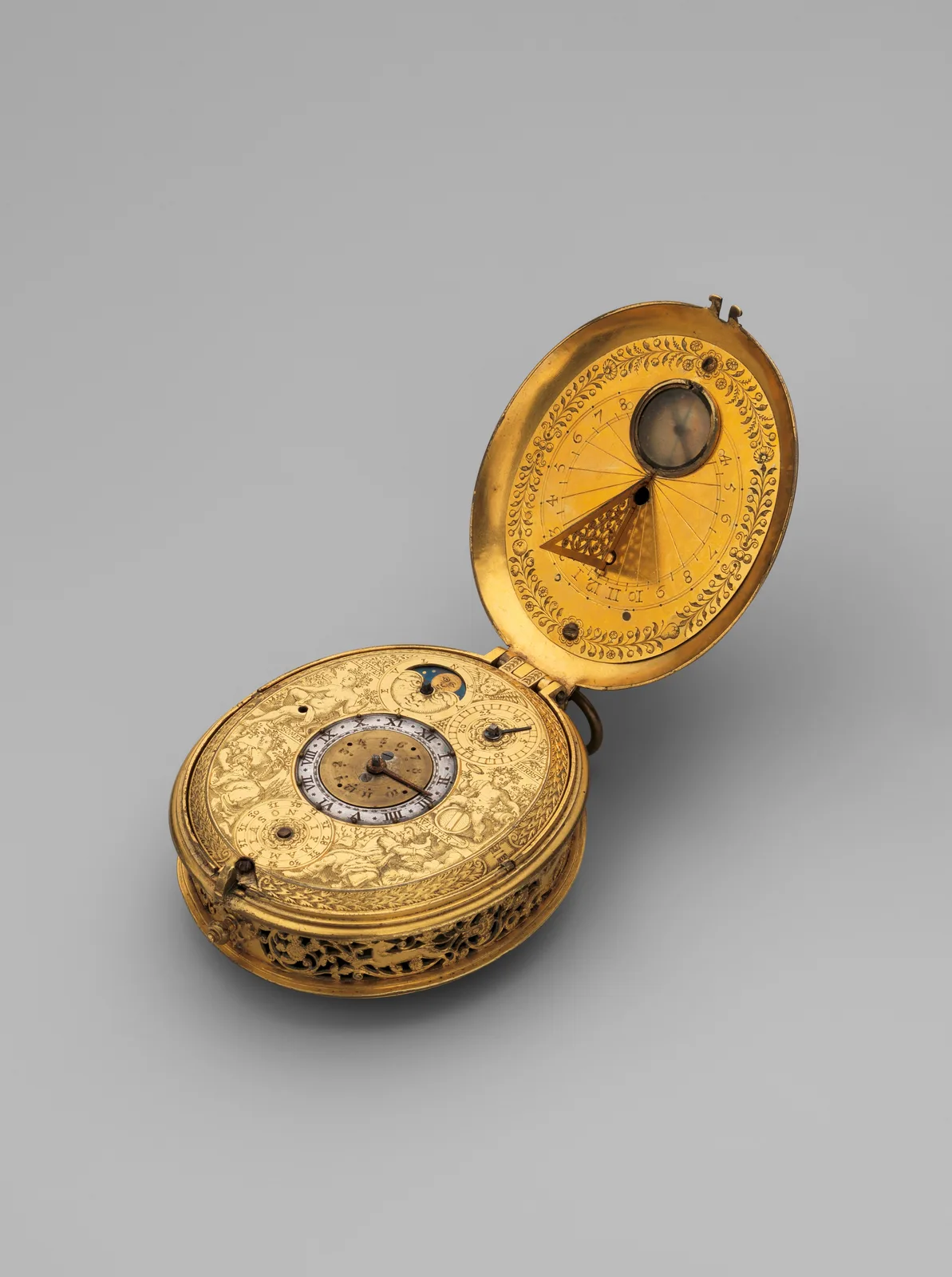 Gilt clock watch with astronomical dial and folding sundial, opened to show both faces
